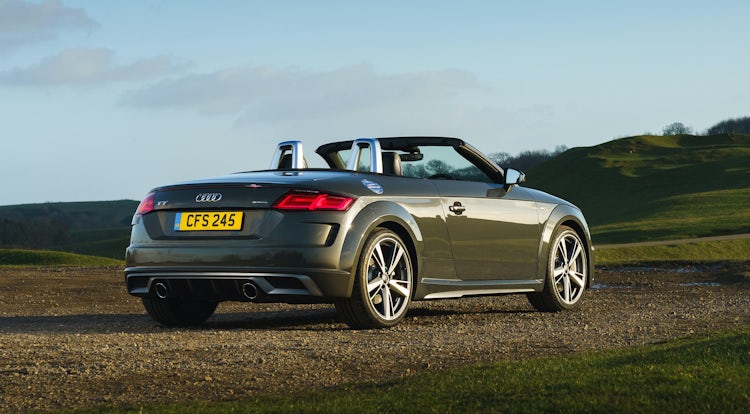 audi tt roadster with the roof down