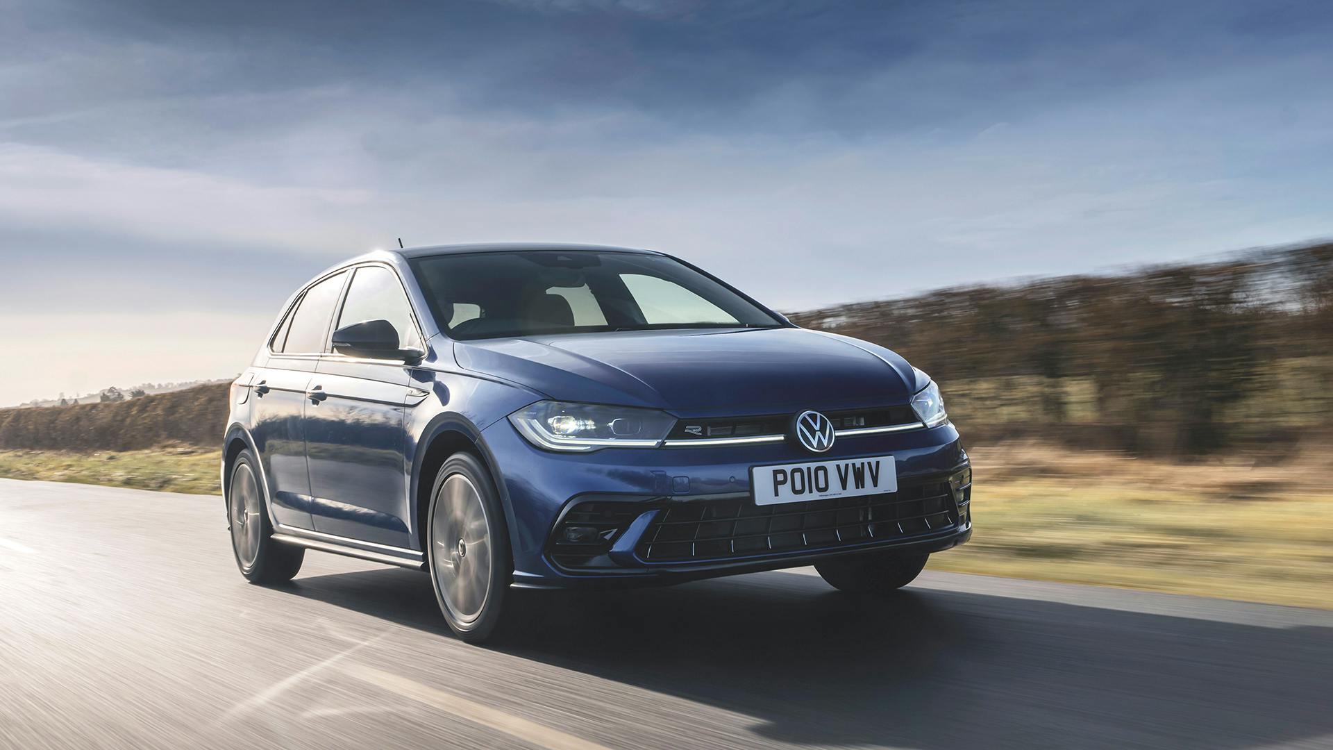 2025 Volkswagen Polo, RHD, purple, exterior front three quarter view driving