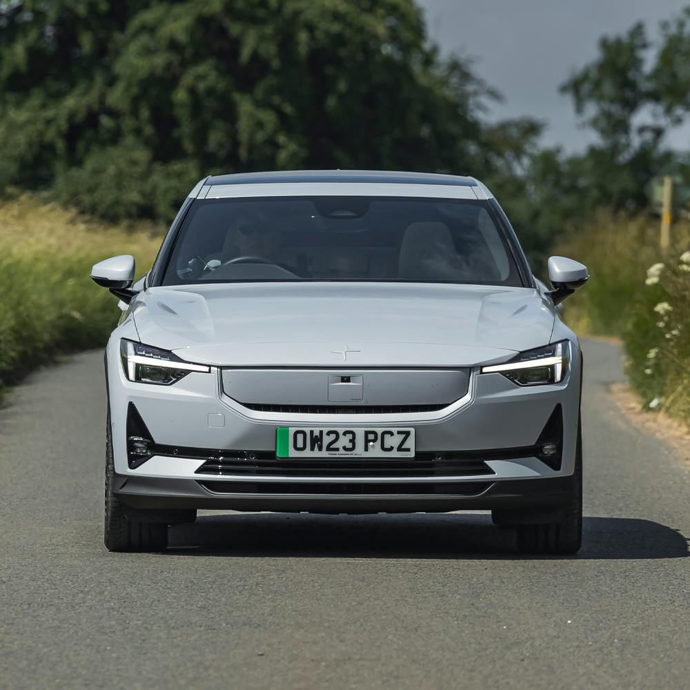 2023 white Polestar 2 front on a country road